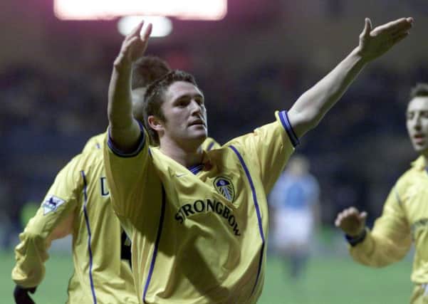 Leeds United's Robbie Keane celebrates scoring against Manchester City at Maine Road in January 2001. Picture: PA/ Nick Potts.