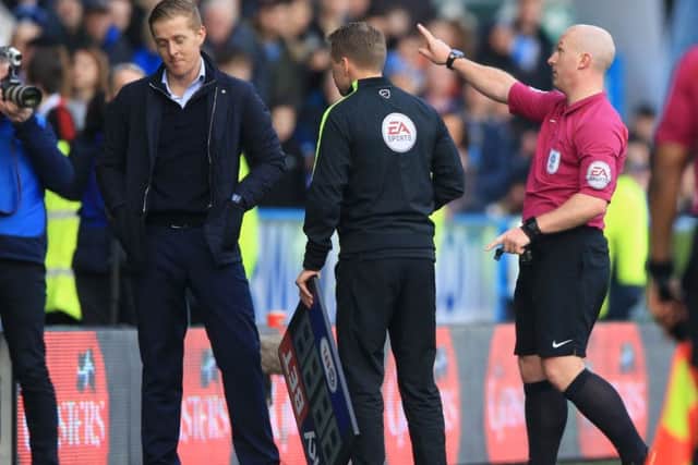 OFF WITH YOU: Leeds United manager Garry Monk is sent to the stand by referee Simon Hooper. Picture: Nigel French/PA