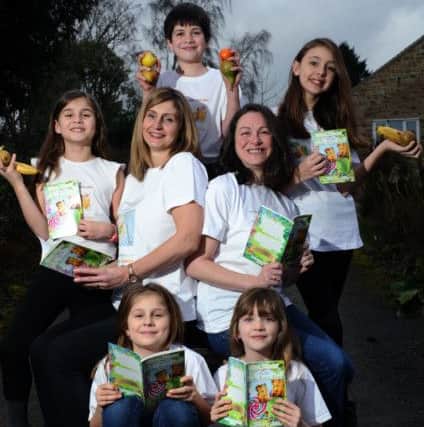 Bardsey mums Hayley Dodsworth and Donna Harrison, right, launch their book  Emma Bright and The Super Food Fight, to encourage fussy eating children to try new foods. Pictured with children clockwise from left, Oliva Dodsworth, Peter Harrison, Emma Dodsworth, Lyla Harrison and Anna Dodsworth.2nd February 2017.Picture : Jonathan Gawthorpe