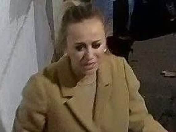 Police believe this woman may have witnessed the assault.