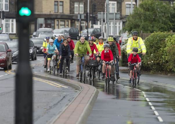 Date: 30th June 2016. Picture James Hardisty.
Official opening of the CityConnect Cycle Superhighway connecting Leeds and Bradford. Pictured Cyclist using the lane near Thornbury Gyratory, Bradford.
