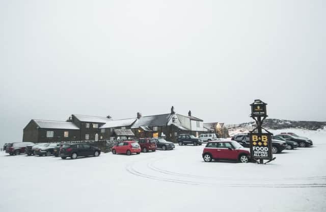 Snowy conditions at the Lion Inn in the North York Moors National Park. PIC: PA