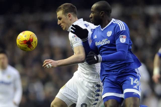 Chris Wood is challenged by Sol Bamba.