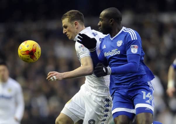 Chris Wood is challenged by Sol Bamba.