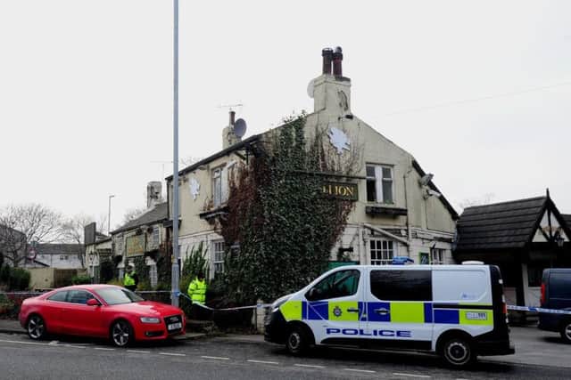 The scene at the Old Red Lion pub
