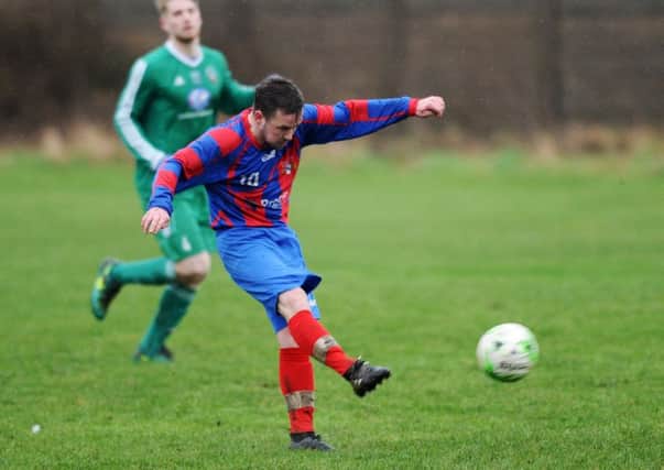 Swillington's Jamie Scott fires a goal in from long range against Chapeltown Fforde Grene. PIC: Jonathan Gawthorpe
