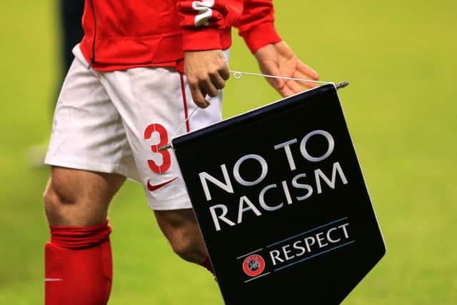 Continuing battle: Racism still remains an issue in sport today. (PA).