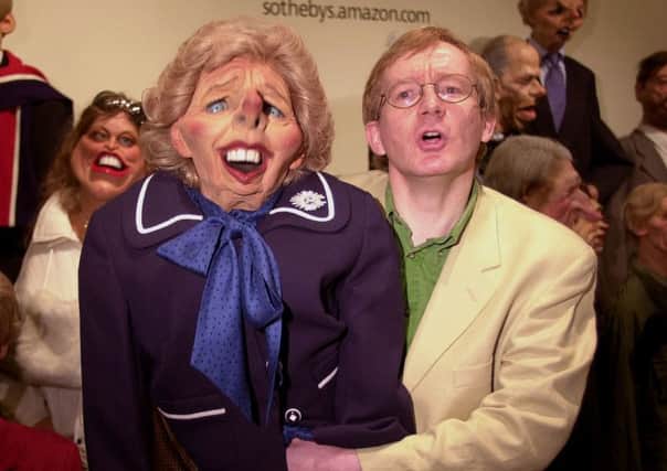 Margaret Thatcher with the man who did her voice, Steve Nallon, as Spitting Image puppets are displayed for auction at Sotheby's in London Friday 7 July 2000.  More than 200 puppets and 100 sketches from the Spitting Image show are 
being sold by Sotheby's on behalf of one of its creators Roger Law at www.sothebys.amazon.com over a fortnight. See PA story SALE Spitting. PA photo: Toby Melville.