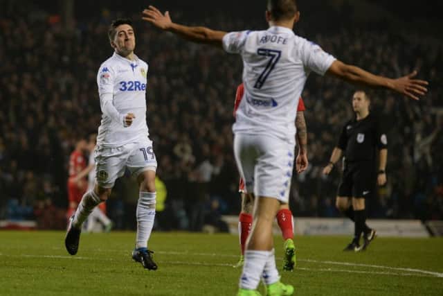 Pablo Hernandez celebrates scoring Leeds United's second goal with Kemar Roofe. PIC: Bruce Rollinson