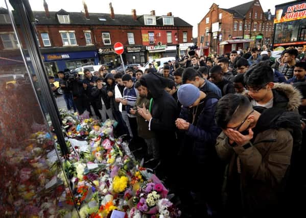 The  Harehills community come together for a vigil for murdered teenager Irfan Wahid. PIC: Simon Hulme
