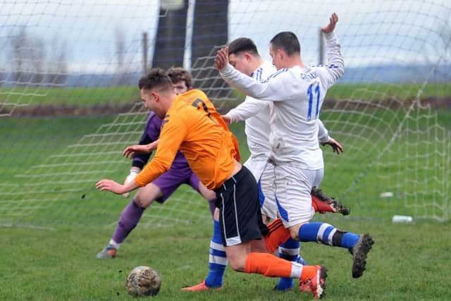 JB Celtic's Richard Banks goes down under the challenge of Mark Whittall, of Kirkstall Crusaders - but no spot kick was awarded.  PIC: Tony Johnson