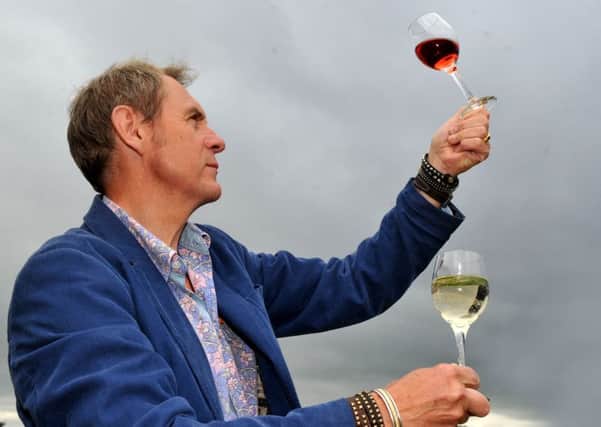 310816  Nigel Barden from the BBC Food and Drink show  one of the judges  for thr  Deliciously Yorkshire Taste Awards  judging some Yorkshire wine at the Pavilions in Harrogate.