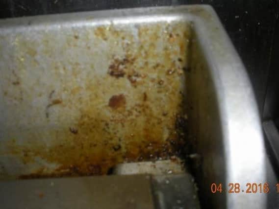 This photo was taken by an environmental health officer in the kitchen at Dixy Chicken