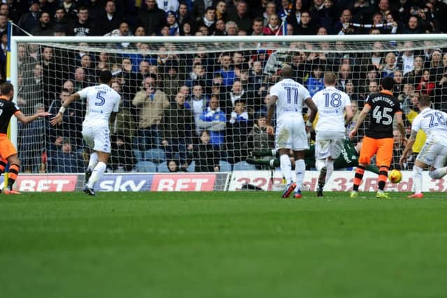 Leeds United's Rob Green saves a penalty from Wednesday's Jordan Rhodes.