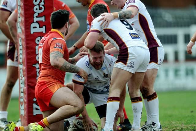 Batley's Brad Day is congratulated after scoring the second try against Sheffield. PIC: Jonathan Gawthorpe