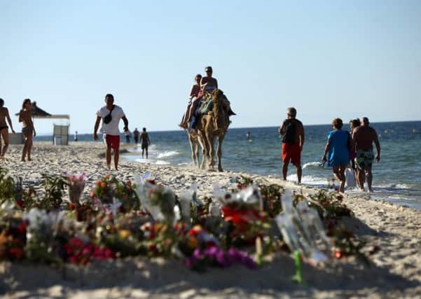 Tributes on the beach near the RIU Imperial Marhaba hotel in Sousse, Tunisia after the attack.