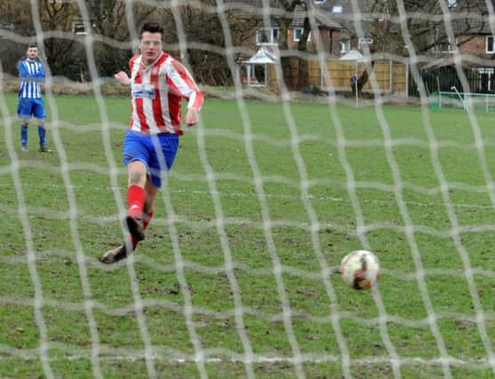 Graham Shaw scores a penalty  for Alwoodley in the 4-0 Terry Marflitt Trophy win overBeeston Juniors. PIC: Steve Riding