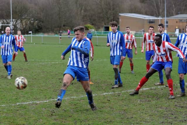 Dale Kellett clears for Beeston Juniors in their Terry Marflitt Trophy clash at Alwoodley. PIC: Steve Riding