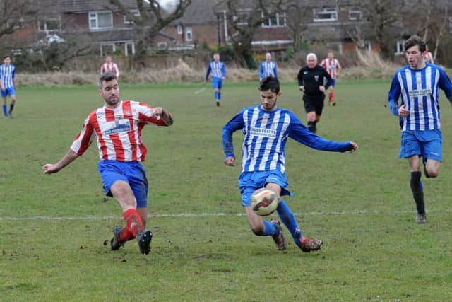 Rob Oxley crosses for Alwoodley in the 4-0 win over Beeston Juniors in the Terry Marflitt Trophy. PIC: Steve Riding