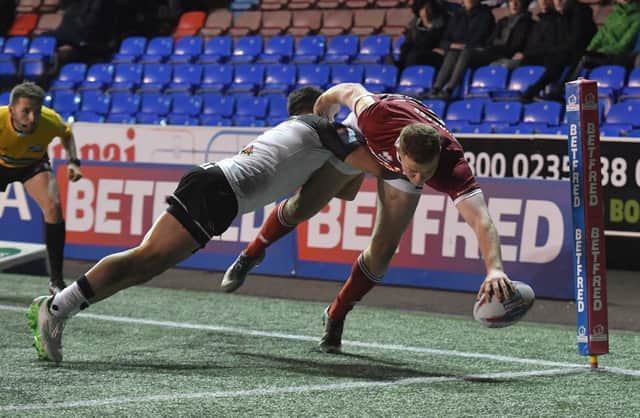 Joe Burgess  scores his side's  third try

against Widnes.