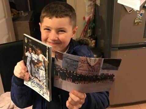 A happy chappy: Little Harry, six, got a replacement programme