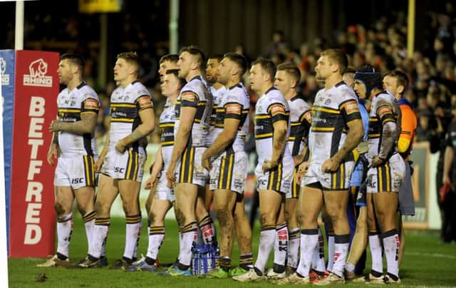 Rhinos players line-up after another Cas try.