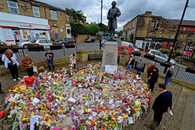 A sea of flowers placed at a memorial in Birstall, after Labour MP Jo Cox was shot and stabbed to death in the street outside her constituency advice surgery.