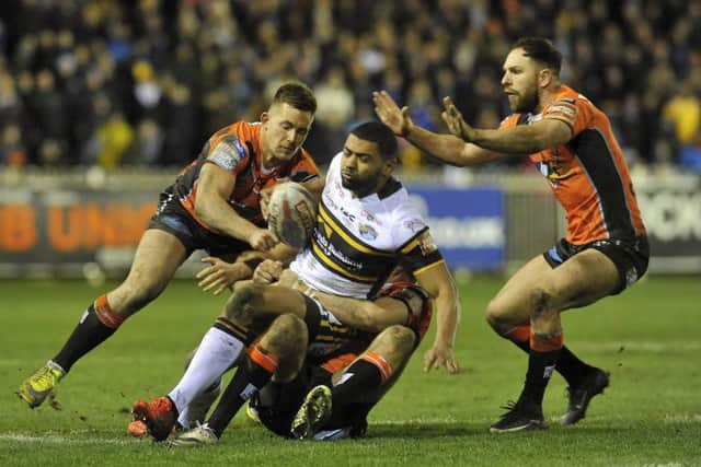 Kallum Watkins is tackled during Leeds Rhinos' defeat to Castleford Tigers.