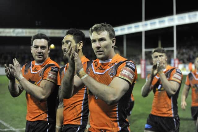 Captain Michael Shenton leads the team's applause for fans who witnessed the Tigers' demolition of Leeds Rhinos last time out.