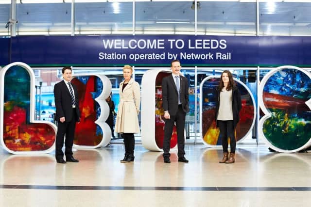 New artwork for the Windows of Leeds letters unveiled on Monday morning.Image 28 shows (L-R) Stephen Hind, Route Enhancements Manager at Network Rail, Sarah Dear LeedsBID Board member, Andrew Cooper LeedsBID Chief Executive and Artist Abi Moffat. The letters, a 2-metre-high typographic sculpture, provide local artists a platform to shine a light on Leeds hugely talented visual art community while giving an iconic welcome to the station and the city. The new inserts are the work of Leeds College of Art graduate Abi Moffat who has created an abstract and textured interpretation of the city. Each letter has a different theme from the changing culture of day to night-life, colours of the city, the variety of architecture, place and people, and the environment and weather.