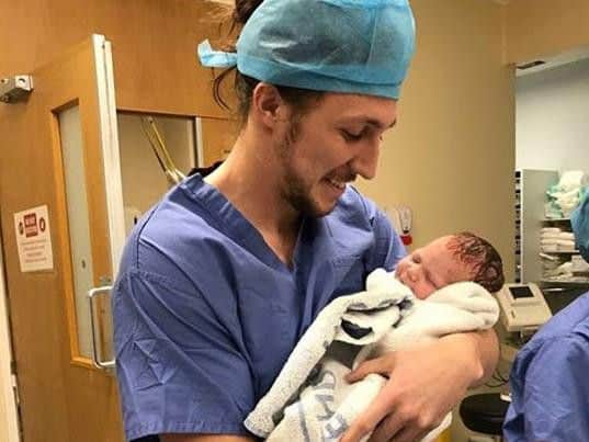 Luke with baby Maisie