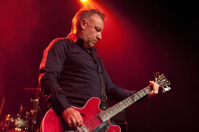 Peter Hook on stage with his band The Light.