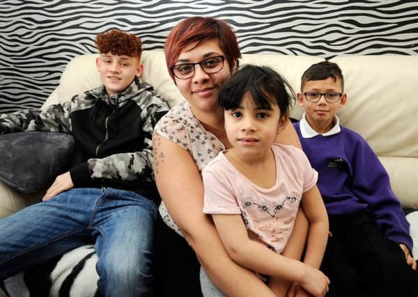 Budget Story...Sonya Joseph pictured with her children from the left Dominic, Lucus and Tayah-Mai, at there home at Leeds...7th March 2017 ..Picture by Simon Hulme