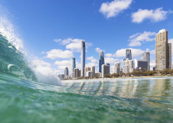 Blue waves rolling on Surfers Paradise beach. PIC: PA