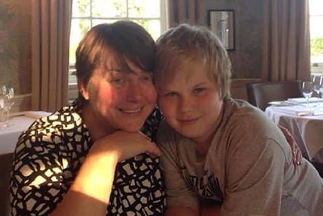 Di Forbes with her son Sam, who developed a sleeping disorder after having a swine flu vaccination.