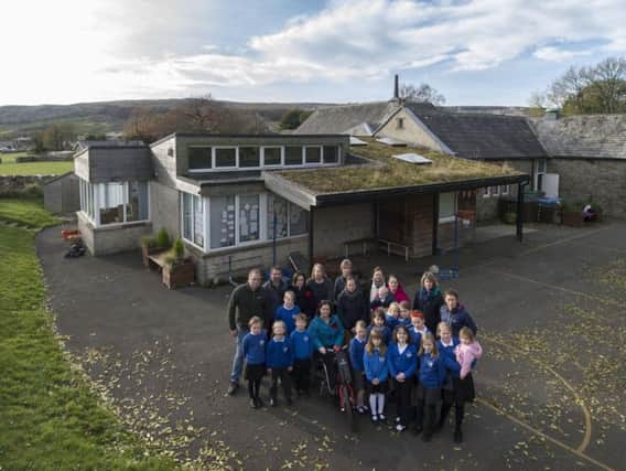 Pupils, parents, and supporters at the school in Horton-in-Ribblesdale who are fighting against the closure. Picture: James Hardisty.