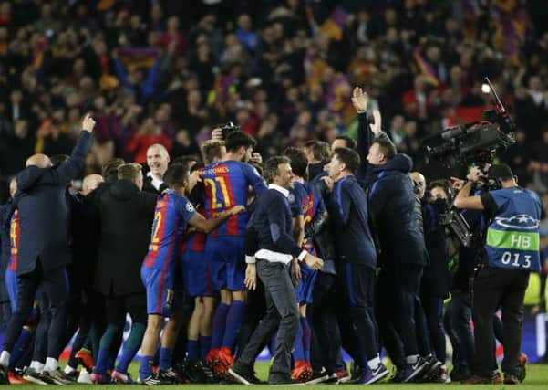 CRAZY SCENES: Barcelona celebrate Wednesday night's epic 6-1 defeat of Paris Saint-Germain.