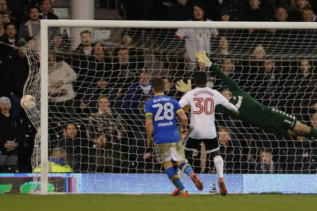 Tom Cairney's scores past Rob Green.