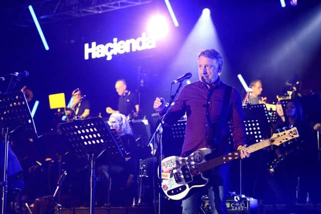 Peter Hook performing Blue Monday with the Manchester Camerata at a Hacienda Classical concert.
