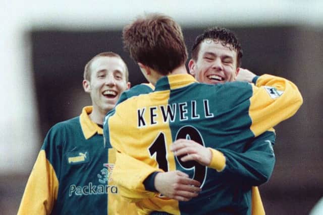 Harry Kewell is congratulated after scoring Leed's fourth goal by Ian Hart and Lee Bowyer during the Premiership clash between Derby v Leeds at Pride Park. It finished 5-0. PIC: PA