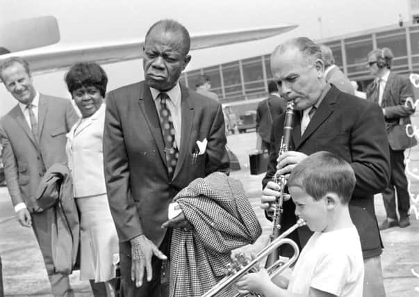 JUNE 1968: Louis Armstrong at Leeds Bradford Airport before his show.