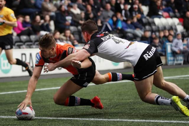 Castleford Tigers Mike McMeeken scores against Widnes.