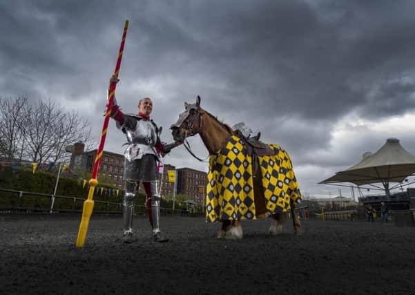 Date:24th March 2016. Picture James Hardisty.
The twentieth anniversary Easter Jousting Tournamnet at the Royal Armouries, Leeds. Pictured Andy Deane, holding Jasmine, from the Royal Armouries who will be representing England during the weekends contest.
