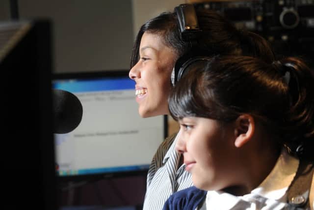 Young DJs Jennah Karim  and her sister Aaliyah, pictured at Fever FM in 2015. Picture by Simon Hulme