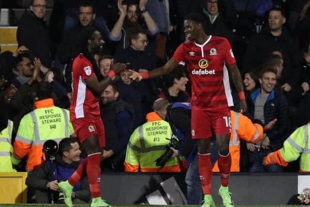 Lucas Joao with Marvin Emnes after scoring a late equaliser for Blackburn Rovers against parent club Sheffield Wednesday's Leeds' promotion rivals Fulham. PIC: PA