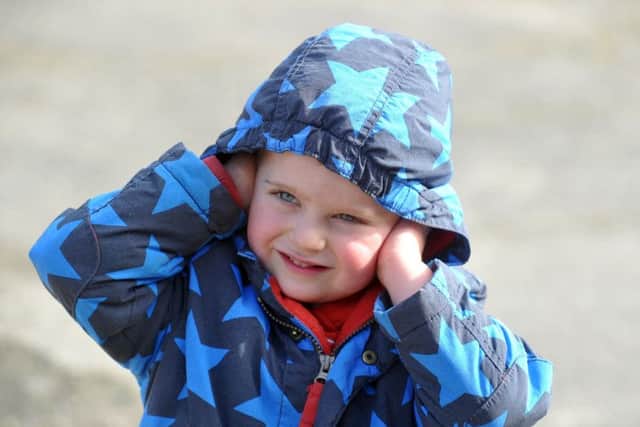 19 March 2017.......   Young Stanley Best, 3, protects his ears from the noisy engines at the 'See How They Run Family Science Day at the National Coal Mining Museum for England. Picture Tony Johnson.