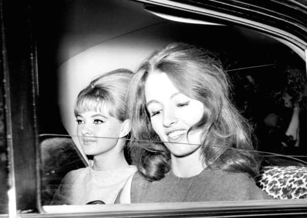 File photo dated 22/7/1963 of Christine Keeler (right) and Mandy Rice-Davies leaving the Old Bailey after the conclusion of the fist day's hearing of the trial at the Old Bailey in which Dr. Stephen Ward, 50 year old osteopath faces vice charges. It is half a century since John Profumo, Secretary of State for War, lied in the House of Commons about having an affair with Christine Keeler.  PRESS ASSOCIATION Photo. Issue date: Wednesday March 20, 2013. See PA story ANNIVERSARY Profumo. Photo credit should read: PA Wire
