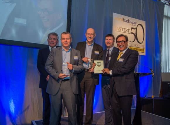Date: 17th March 2017. Picture James Hardisty. Fastest 50 Awards 2017, held at Aspire, Infirmary Street, Leeds. Pictured Winner of the Fastest Growing Business Overall Hisense (left to right) Phil Jordan, of Ward Hadaway, Andrew Wood, of Hisense, Howard Grindrod, of Hisense, Greg Wright, Deputy Business Editor of Yorkshire Post, and guest speaker Larry Gould, CEO of thebigword.