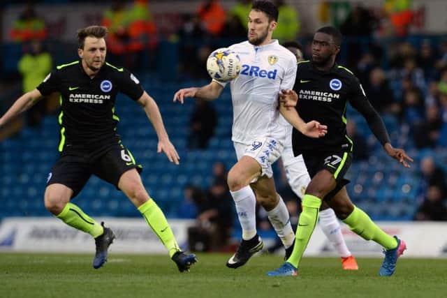 IN THE THICK OF IT: Alfonso Pedraza goes past Dale Stephens and Fikayo Tomori at Elland Road.  Picture: Bruce Rollinson