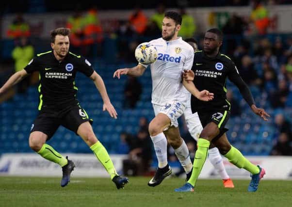 IN THE THICK OF IT: Alfonso Pedraza goes past Dale Stephens and Fikayo Tomori at Elland Road.  Picture: Bruce Rollinson
